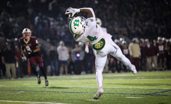 Buford's Jordan Allen bends over backwards to make a catch. 11/13/2023